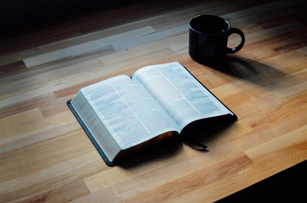 bible and coffee cup on wooden table 10 most helpful posts simple theology messy life