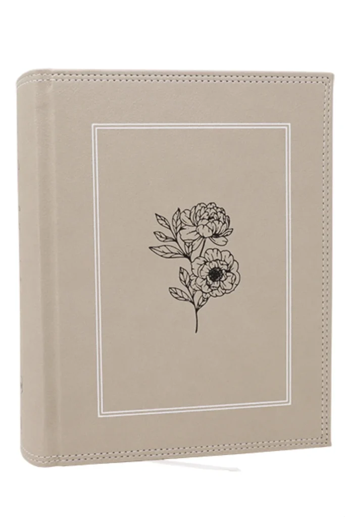 Journal the Word Bible in stone colored hardcover format with a decorative flower on the front cover.