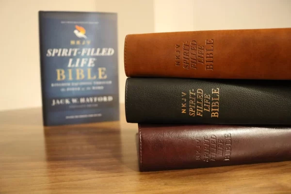 3 NKJV Spirit Filled Life Bibles stacked on table