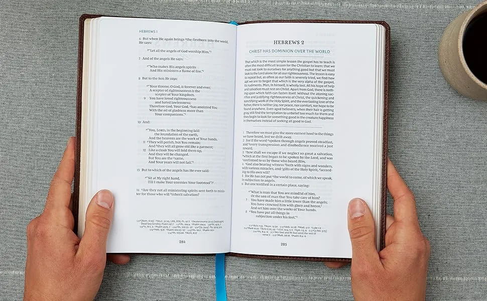 Open pages of Spurgeon and the Church showing the book of Hebrews and Charles Spurgeon devotional content