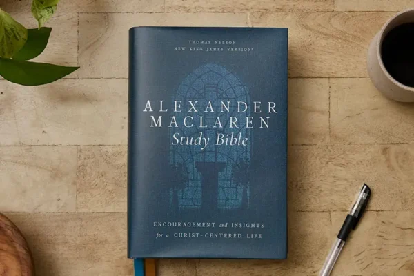 Alexander Maclaren Study Bible hardcover edition on a wooden table