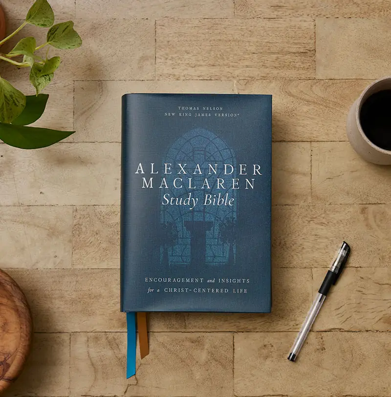 Alexander Maclaren Study Bible hardcover edition on a wooden table